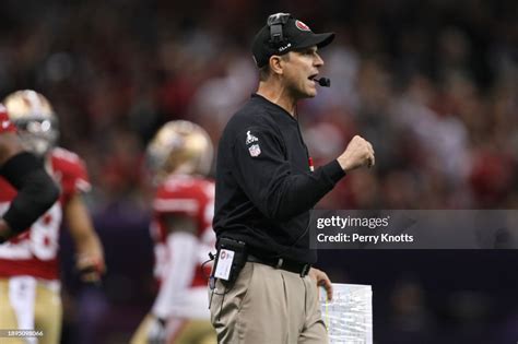 San Francisco 49ers head coach Jim Harbaugh looks on from the... News Photo - Getty Images