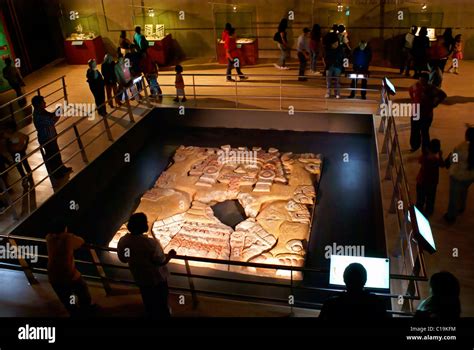 People at the Tlaltecuhtli sculpture exhibit in the Templo Mayor Stock Photo, Royalty Free Image ...