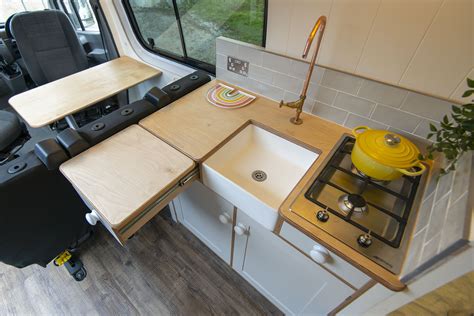 camper van kitchen with resin belfast sink | Best campervan, Campervan conversions, Van ...