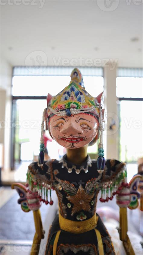 Indonesian authentic wayang golek, wooden carved rod puppet. 17008627 Stock Photo at Vecteezy