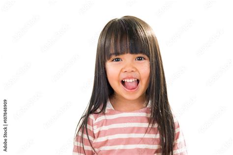 Asian smiling little girl portrait isolated on white Stock Photo | Adobe Stock