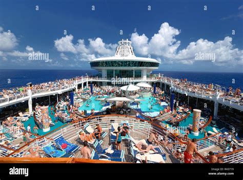 The pool deck on Royal Caribbean's Adventure of the Seas cruise ship is ...