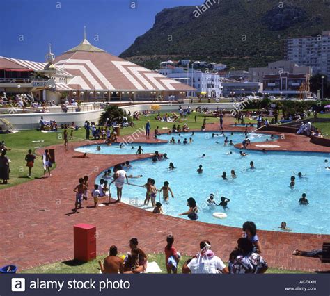 Bathers crowding into the swimming pool at Muizenberg Pavilion Cape ...