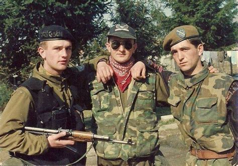 Bosnian fighters, 1994. The one on the left is a Mujah foreign volunteer, while the other two ...