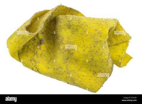 Yellow dirty cleaning rag isolated on white Stock Photo - Alamy