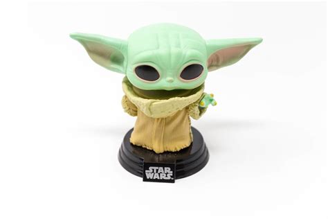 The Mandalorian - Baby Yoda. Favorite Star Wars character in a vinyl bobblehead figure ...