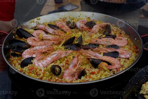 Spanish paella prepared in the street restaurant 7420181 Stock Photo at ...