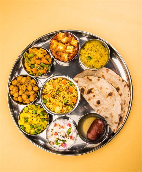 Premium Photo | Indian or Hindu Veg Thali also known as Food platter is a complete Lunch or ...