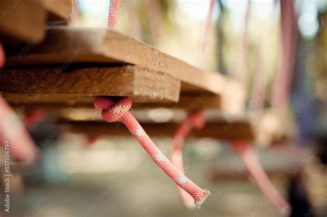 Knots tied to a safety rope and a carbine. Stock Photo | Adobe Stock