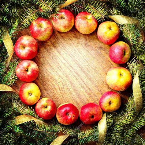 Christmas tree with apples and decorations on a wooden board — Stock ...