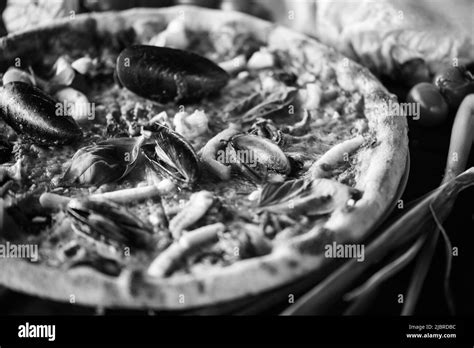 delicious italian pizza with fresh seafood Stock Photo - Alamy