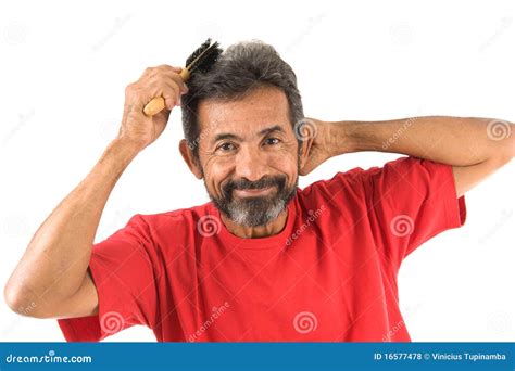 Man combing hair stock photo. Image of hands, emotion - 16577478