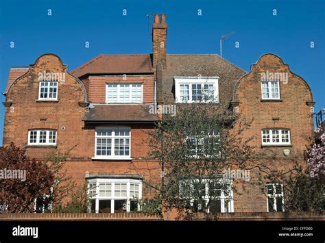 semi-detached houses in bedford park, london, england, with architectural features typical of ...