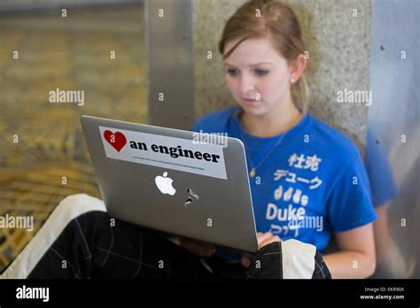 Detroit, Michigan - A female Duke University engineering student works on her laptop Stock Photo ...