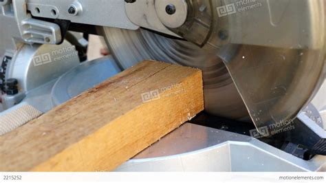 Industrial Miter Saw Cutting Wood Stock video footage | 2215252