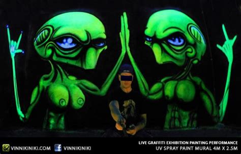 Black light alien art graffiti mural in Thong Lor, Bangkok