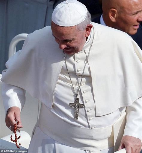 That moment when you're pope, and you catch a rosary --with your ear ...