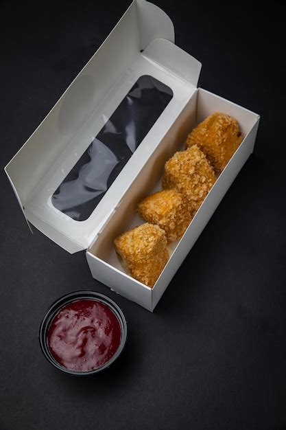 Premium Photo | Fried Mac and Cheese Bites with Dipping Sauce