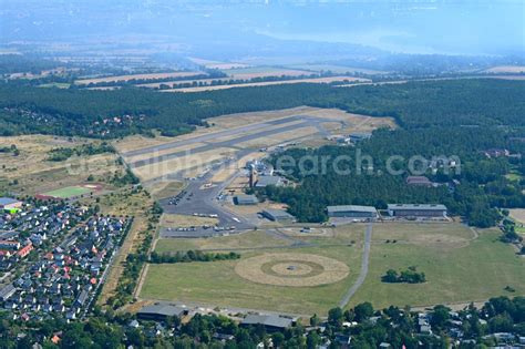 Berlin from above - Runway with tarmac terrain of airfield Militaerhistorisches Museum of ...