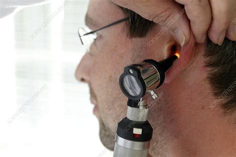 Ear examination - Stock Image - C007/1339 - Science Photo Library