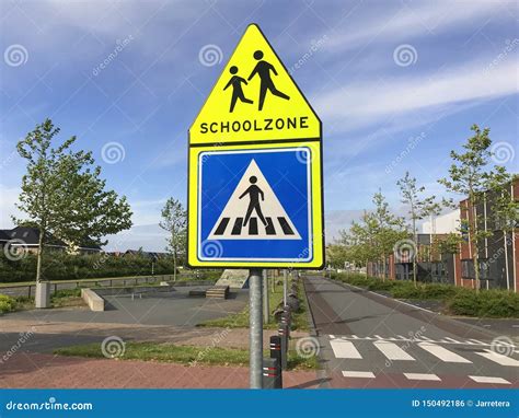 Road Sign Warning for a School Zone. Stock Photo - Image of zone, signal: 150492186