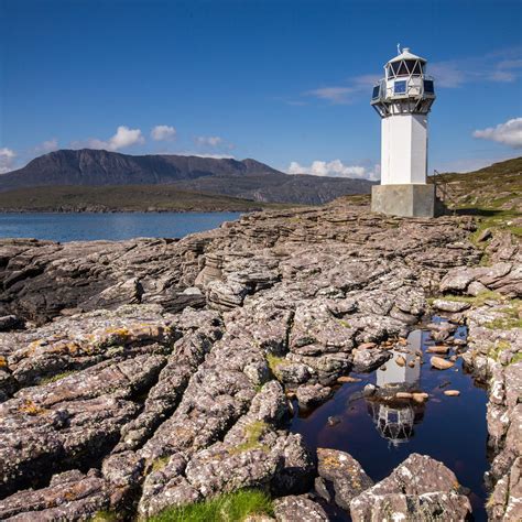 Rhue Lighthouse just North of Ullapool in North West Scotland | Lighthouse, Lighthouse point ...