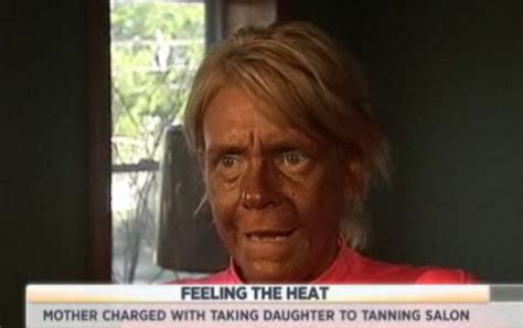 Tan-a-holic Lady Arrested for Taking Kid Into Tanning Booth - TheCount.com