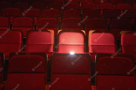 Premium Photo | Red seats in the theater