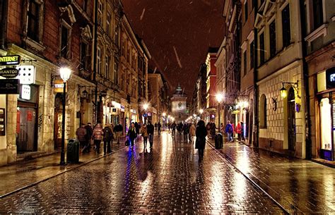 Picture Poland People Street Pavement night time Street lights