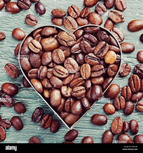 coffee beans as background from good roasted coffee beans with heart ...