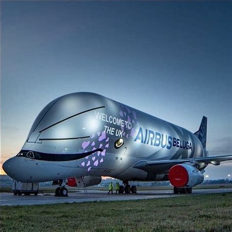 an airplane that has been painted with the words welcome to the uk and is on display