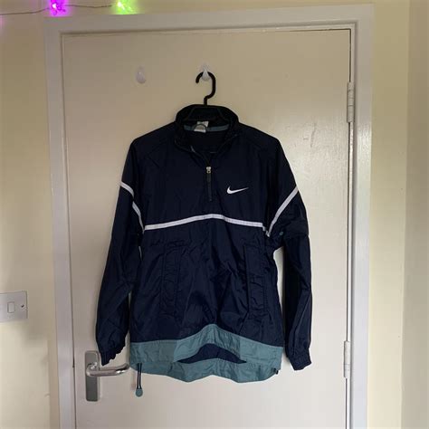 Fire Nike quarter zip waterproof/windbreaker jacket... - Depop