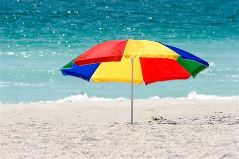 Colorful Beach Umbrella stock image. Image of solitude - 2236119