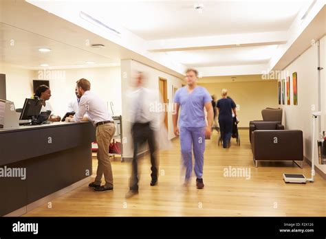 Busy Nurse's Station In Modern Hospital Stock Photo - Alamy