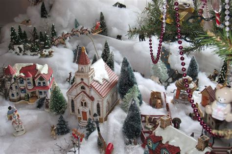 a christmas village with lots of houses and trees