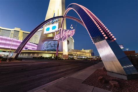 ILLUMINATED GATEWAY ARCHES WELCOME VISITORS TO DOWNTOWN LAS VEGAS