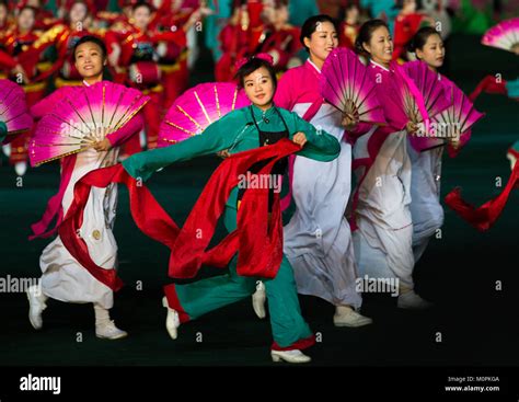 North Korean women dancing in choson-ot during the Arirang mass games ...