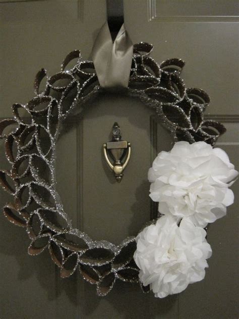 winter wreath...made from flattened and cut toilet paper tubes, glued together then painted and ...