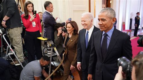 Biden and Obama meet at the White House for health care access event : NPR