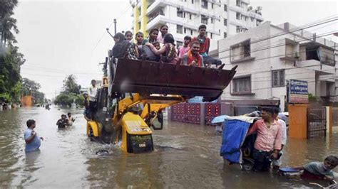 Surging floods in Bihar have spread to 11 districts affecting nearly 15 ...