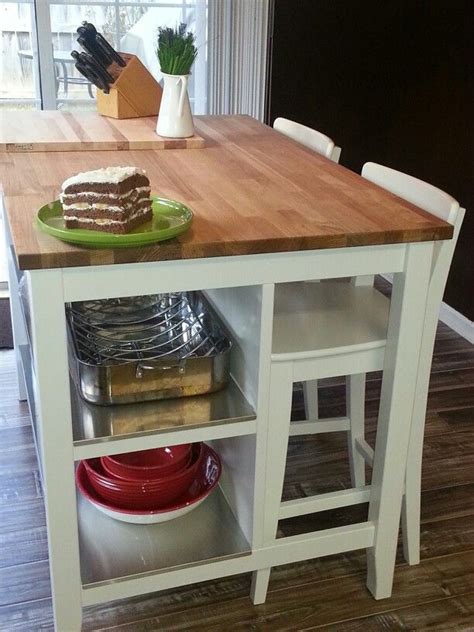 IKEA's Butcher block table with stainless steel shelves….visit ikea.com….fantastic for sm ...