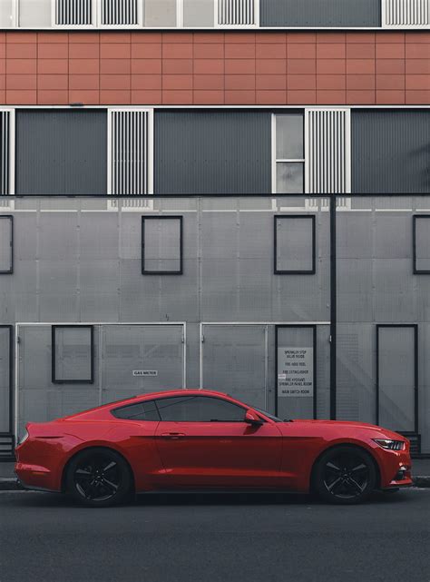 Red Ford Mustang coupe parked beside the building, HD phone wallpaper ...