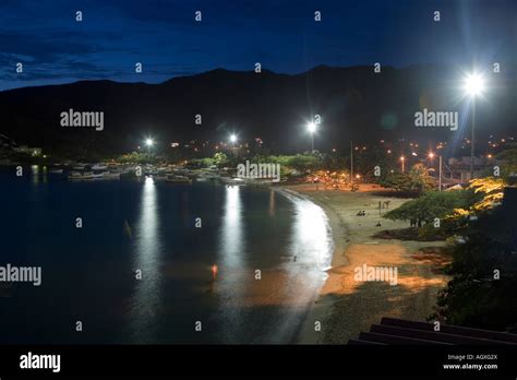 Taganga beach by night Stock Photo - Alamy