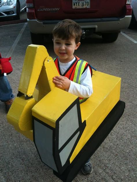 My little guy LOVES construction. My husband made him this working excavator costume for ...