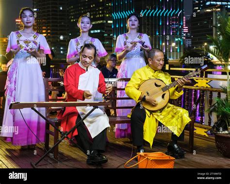 Orchestra Playing Traditional Vietnamese Music with Dan Bau and Dan Nguyet Stringed Instruments ...