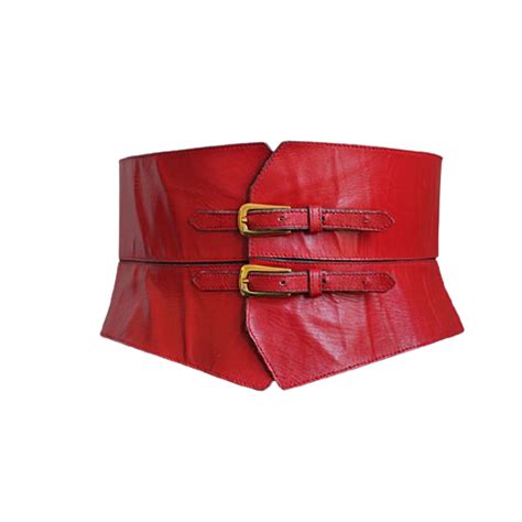 Shades of red: Valentino patent-leather coat, YSL leather corset belt and shoes (unknown ...