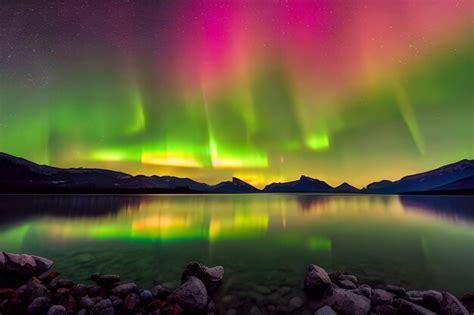 Premium AI Image | A view of the aurora borealis over a lake