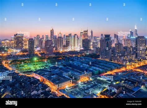 shanghai modern building skyline in nightfall Stock Photo - Alamy