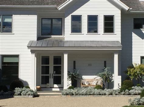 white shiplap siding + gray windows +metal roof | Shiplap siding, White shiplap, Window trim ...