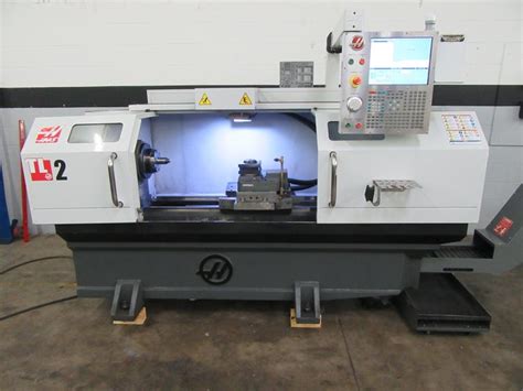 Haas TL-2 CNC Tool Room Lathe with 4-Station Programmable Turret, Tailstock and Jorgenson Chip ...